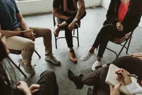 Diverse people in a IOP program session